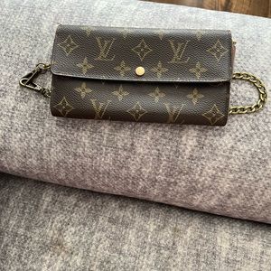 Sold ****Authentic LV WALLET, including unbranded chain to wear crossbody